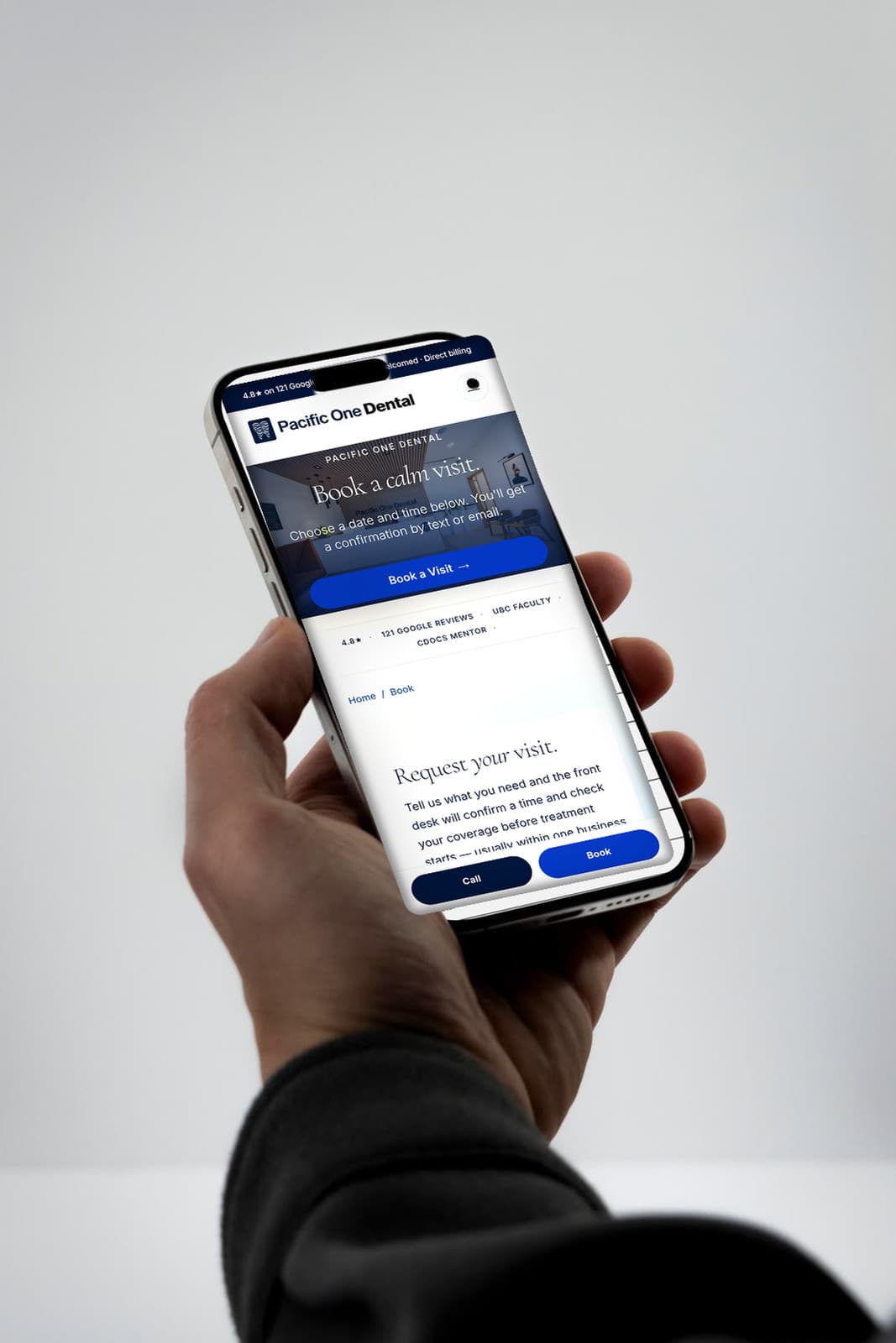 Pacific One Dental booking page on a phone, with Book a Visit and the sticky Call and Book bar within thumb reach