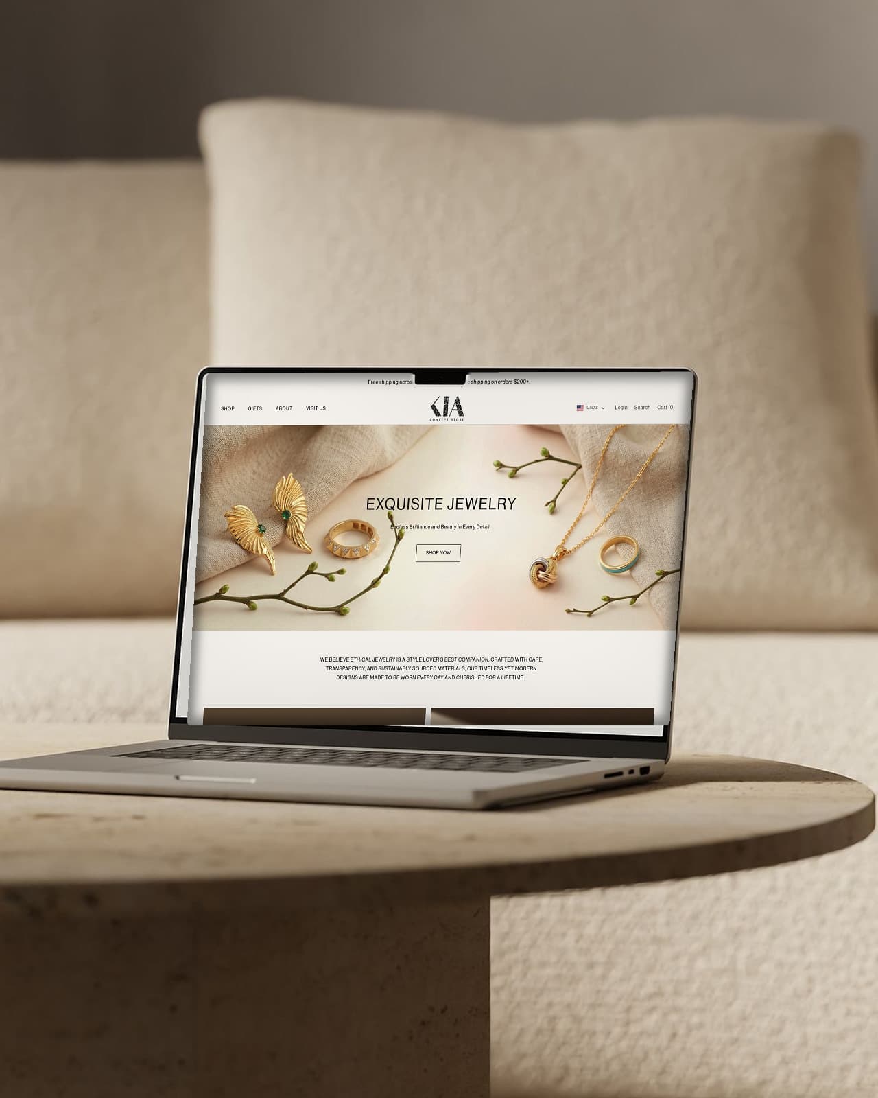 Kia Concept Store Shopify storefront homepage on a laptop: the ethical jewelry hero Side designed, built on Prestige