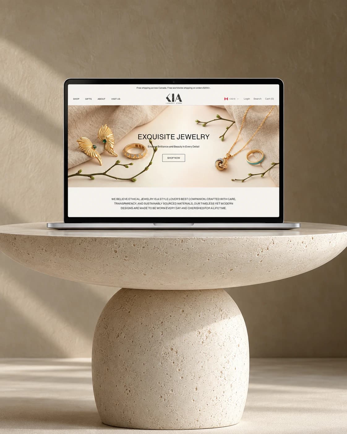 Kia Concept Store Shopify homepage on a laptop, on a sculpted stone pedestal