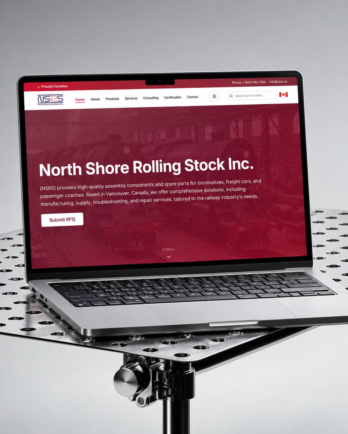 NSRS North Shore Rolling Stock homepage on a laptop, on a perforated steel stand