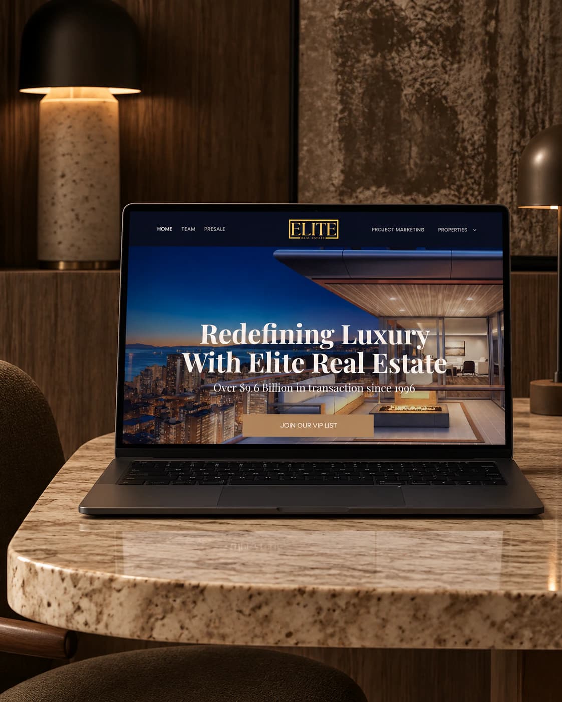 Vancouver Elites homepage on a laptop, on a marble table: Redefining Luxury With Elite Real Estate