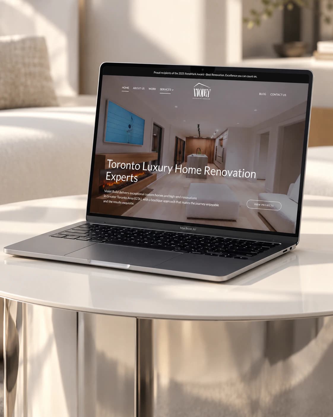 Violet Build homepage on a laptop: Toronto luxury home renovation experts hero
